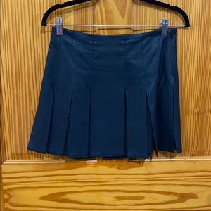 Pleated faux leather mini skirt